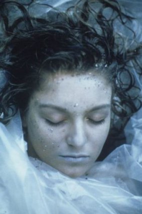 Twin Peaks' Laura Palmer, wrapped in plastic: "I will see you again in 25 years".