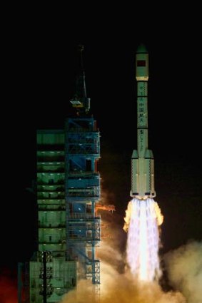China's first space laboratory module Tiangong-1 linked up with the Shenzhou -9 spacecraft on Sunday.