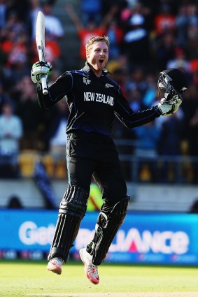 Martin Guptill celebrates after reaching the 200-run mark against West Indies.