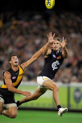 Richmond's Alex Rance (left) is too late to stop Carlton's Jarrad Waite from marking during a clash earlier this season.