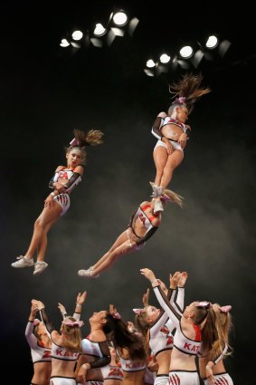 Athletes compete during the Australian Cheerleading Championships at the Melbourne Convention and Exhibition Centre on Saturday. 