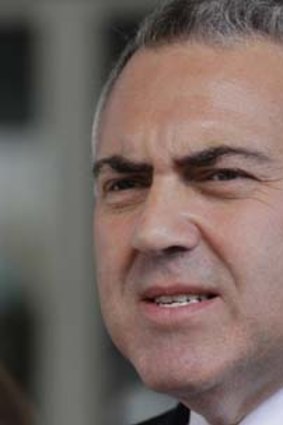 "The carbon tax is meant to cause injury, it's meant to change behaviour, and that's why the government compensates" : Shadow treasurer Joe Hockey.