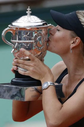 Maria Sharapova blasted her way to victory over Sara Errani in the French Open final to become only the 10th woman to complete a career grand slam.