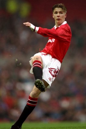 Where it all began: David Beckham in action for Manchester United's youth team.