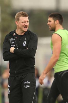 Nathan Buckley and Chris Dawes at Collingwood training last month.
