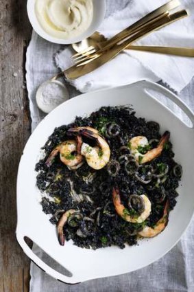 Prawn, squid ink and smoked bacon paella.