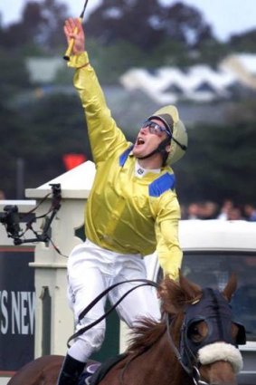 Top jockey Damien Oliver winning the Melbourne Cup in 2002.