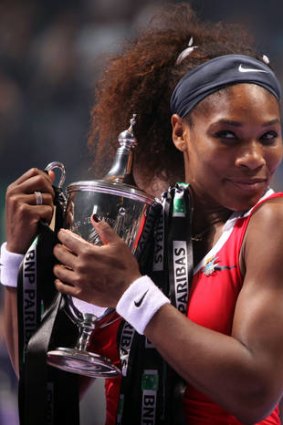 Class above: Serena Williams with the spoils of victory in Turkey.