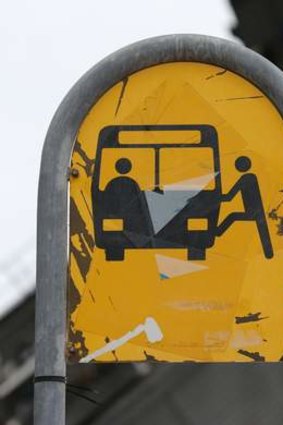 An ageing bus sign.