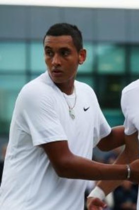 Nick Kyrgios of Australia shakes hands with Jiri Vesely of Czech Republic after their Men's Singles third round match on day six at Wimbledon