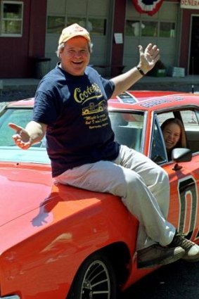 Ben 'Cooter' Jones with a hotrod used in shooting for the <i>Dukes of Hazzard</i> back in 1999.