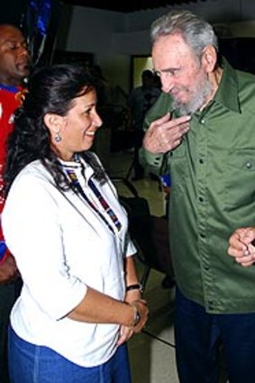 Fidel Castro talks to a journalist.