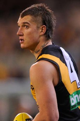 Dustin Martin's upbringing was not easy, but he appears to have found a home at Tigerland where he feels secure, happy and well liked.