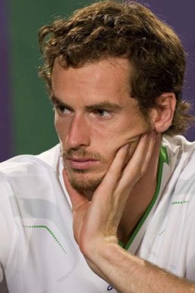 A dejected Andy Murray confronts the media following his defeat by Rafael Nadal.