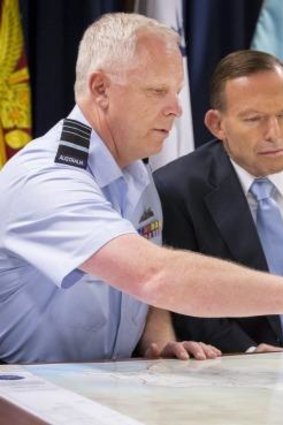 Airstrikes to begin in coming days: Tony Abbott is briefed by Mark Binskin. 