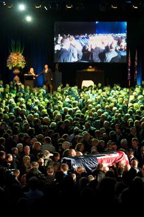 Lionel Rose's coffin is carried from Festival Hall.