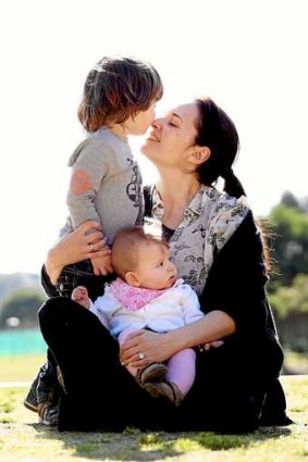 Favours a firm voice:  Yvette Andronicus with son Charlie, 2, and daughter, Gigi, seven months.
