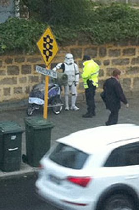 Spotted in West Perth - Jacob French dressed as a Storm Trooper receives a talking to from the Federal Police.
