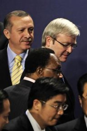 Kevin Rudd talks to Barack Obama at the G20 summit, London, 2009. Also pictured are, clockwise from top left, Turkey's Tayyip Erdogan, Britain's  Gordon Brown, China's Hu Jintao, an unidentified translator and South Africa's Kgalema Motlanthe.