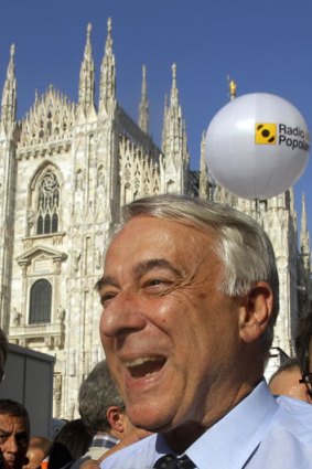 ‘‘We have won this campaign with smiles and a sense of irony ... Milan has been liberated. Now for the rest of Italy’’ ... Giuliano Pisapia joins the crowd in Piazza del Duomo to savour his victory.