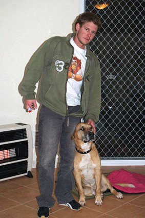 Christopher Halstead, 26, with his dog Jasper.