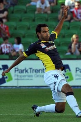 Central Coast's Marcos Flores (left) in the 2-2 draw with Melbourne Heart.