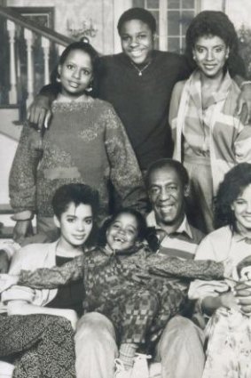 <i>The Cosby Show</i> in 1987: Bill Cosby (centre) holding youngest 'daughter' Keisha Knight Pulliam and the rest of the Huxtable family.