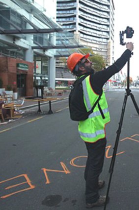 Jason Mill surveys the scene in devasted Christchurch.