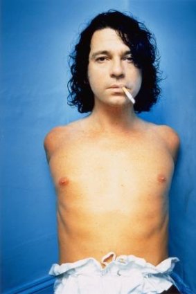 A photograph of Michael Hutchence featuring in <i>Bare: Degrees of undress</i> at the National Portrait Gallery.