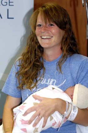 Amber Miller with daughter June, born shortly after Miller completed the Chicago Marathon.