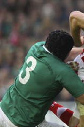 Sam Warburton of Wales is tackled by Mike Ross and Conor Murray of Ireland during the Six Nations match between Ireland and Wales in February.