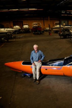 Terry O'Hare with a car he built to contest the world land speed record.