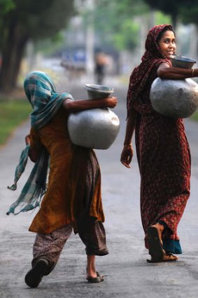 Women carrying drinking water.