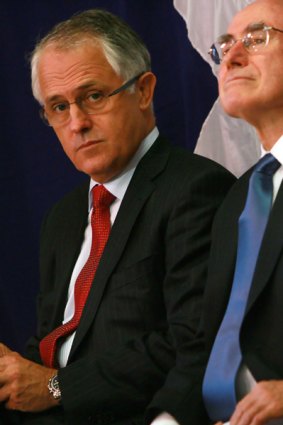 Opposition Leader Malcolm Turnbull (left) with  former prime minister John Howard in Melbourne last night.