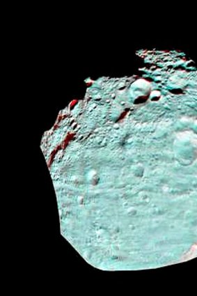 A 3D image of asteroid Vesta's Equatorial Region is see in this August 11, 2011 handout. The anaglyph image of Vesta's equator was put together from two clear filter images, taken on July 24, 2011 by the framing camera instrument aboard NASA's Dawn spacecraft. The image shows hills, troughs, ridges and steep craters. The framing cameras were developed and built under the leadership of the Max Planck Institute for Solar System Research, Katlenburg-Lindau, Germany, with significant contributions by the German Aerospace Center (DLR) Institute of Planetary Research, Berlin, and in coordination with the Institute of Computer and Communication Network Engineering,Braunschweig. REUTERS/NASA/JPL-Caltech/UCLA/MPS/DLR/IDA/Handout (Tags: - Tags: SCI TECH) FOR EDITORIAL USE ONLY. NOT FOR SALE FOR MARKETING OR ADVERTISING CAMPAIGNS. THIS IMAGE HAS BEEN SUPPLIED BY A THIRD PARTY. IT IS DISTRIBUTED, EXACTLY AS RECEIVED BY REUTERS, AS A SERVICE TO CLIENTS