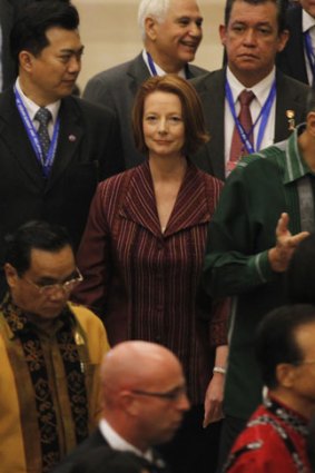 Prime Minister Julia Gillard arrives for the East Asia Summit gala dinner in Nusa Dua, Bali.