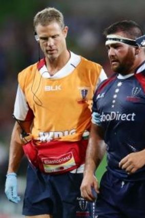 Laurie Weeks leaves the field injured during a match against the Crusaders in March.
