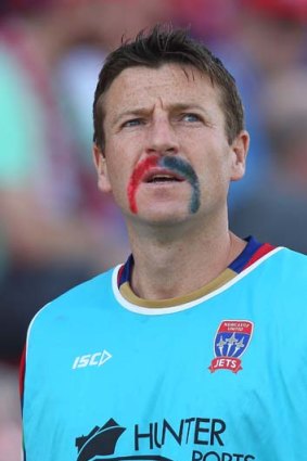 Michael Bridges of the Jets sports a moustache in club colours.