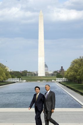 Mr Obama and Mr Abe visiting the Lincoln Memorial in Washington on Monday. 