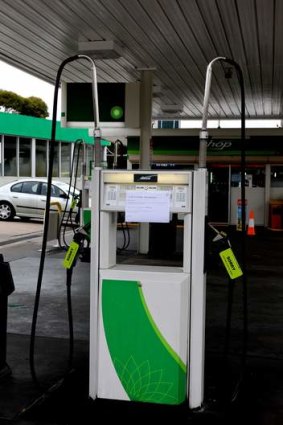 Dry argument: A BP station pump carries a note apologising to motorists.