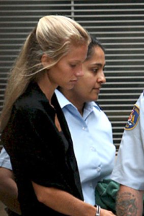 Charlotte Lindstrom is led away to prison after being sentenced last year.
