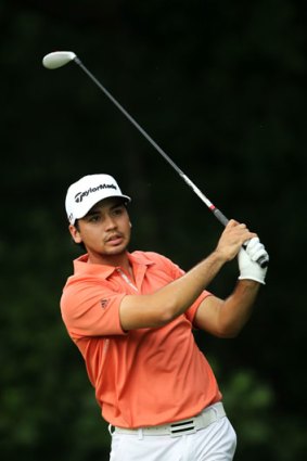 Australia's Jason Day watches his tee shot on the 14th hole on the final dat at the US Open.