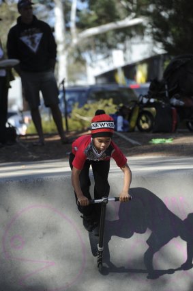 Keedin Cross, 10, of Campbell rides his scooter as part of the festivities.