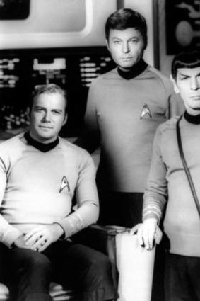 William Shatner, left, with DeForest Kelley, center, and Leonard Nimoy on the television series <i>Star Trek</i>.