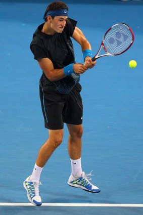 Bernard Tomic in action during day four of the 2012 Brisbane International.