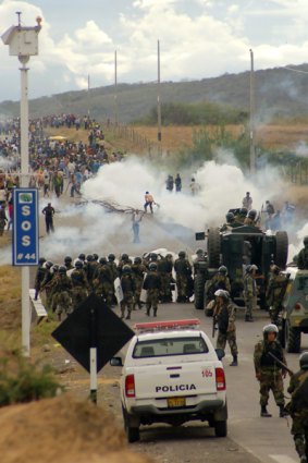Police take up positions in northern Peru against Amazon Indians protesting against decrees that ease rainforest restrictions. 