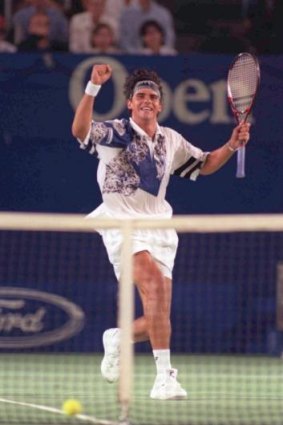 20 Jan 1996: Mark Philippoussis celebrates after winning a point against Pete Sampras in the third round of the Australian Open.