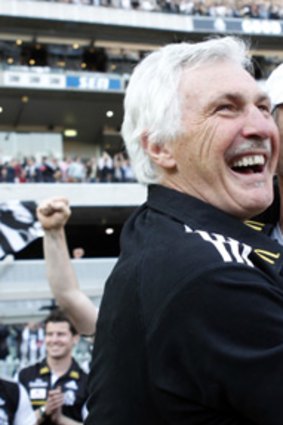 Changing of the guard: Mick Malthouse and David Buttifant.