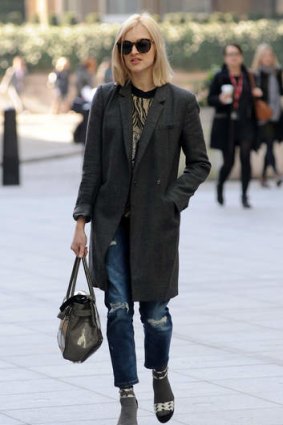 Cuts a stylish look: BBC star Fearne Cotton rocks the ripped jean with ironic smart daywear.