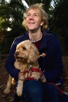 Home boy: Comedian Josh Thomas and his dog John.